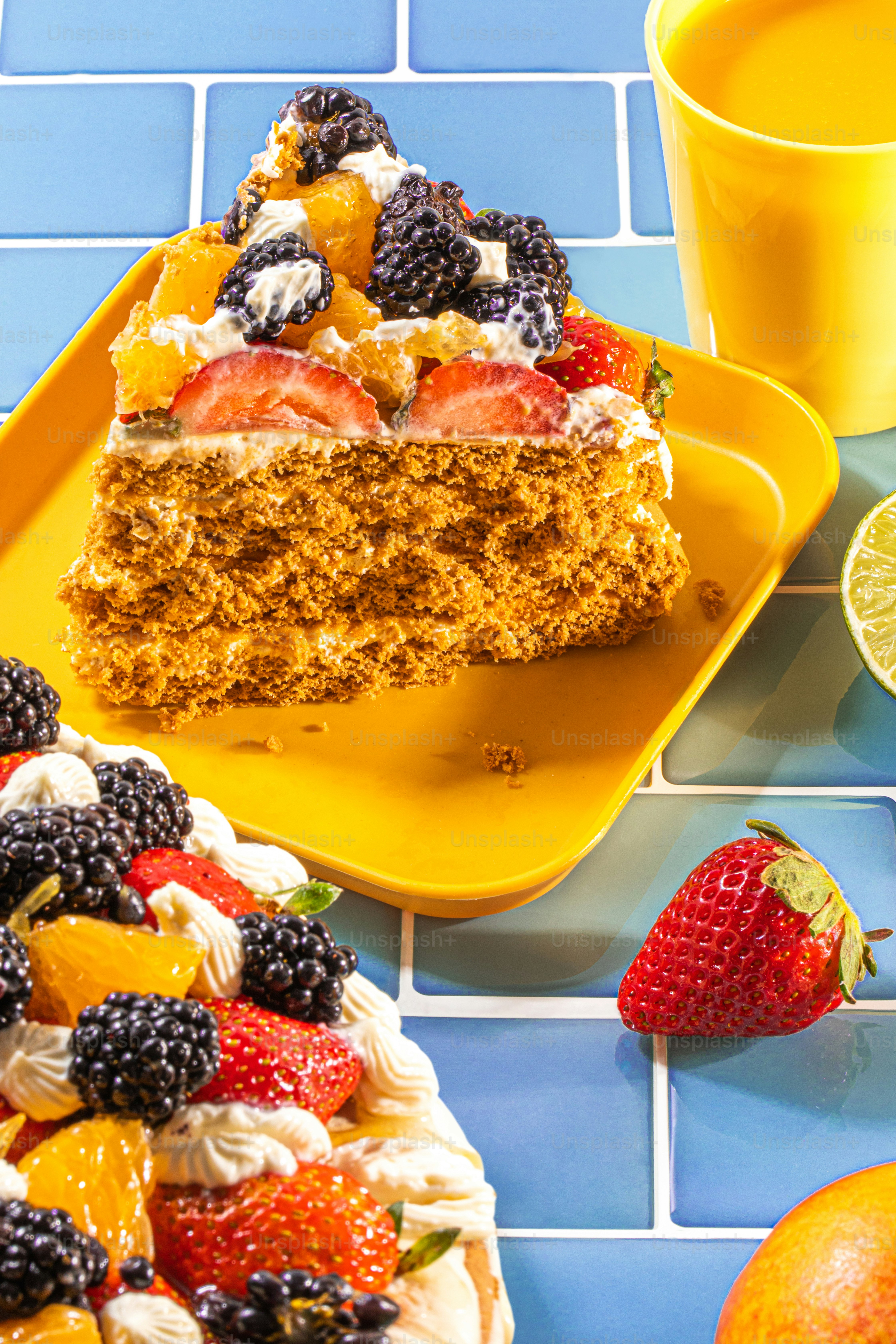 a piece of cake on a yellow plate