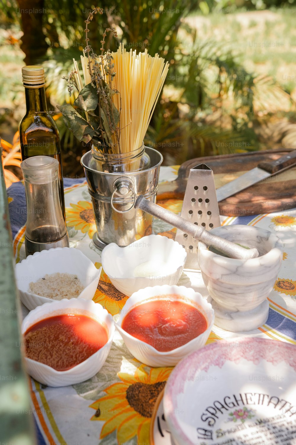 a table topped with bowls and bowls of food