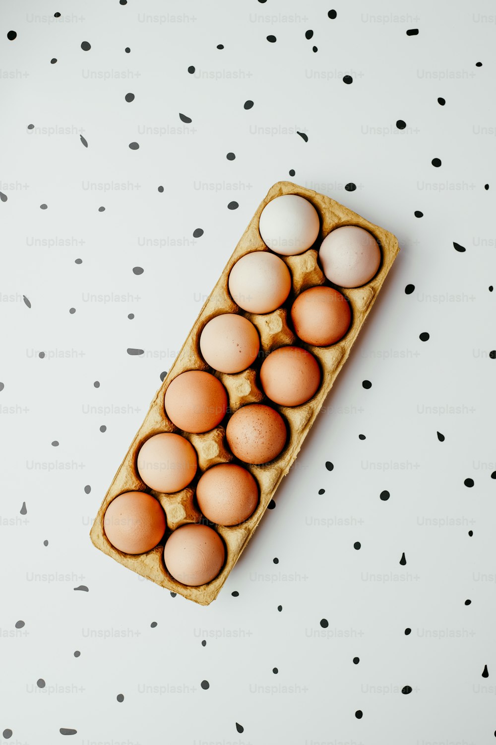 a carton of eggs sitting on top of a table