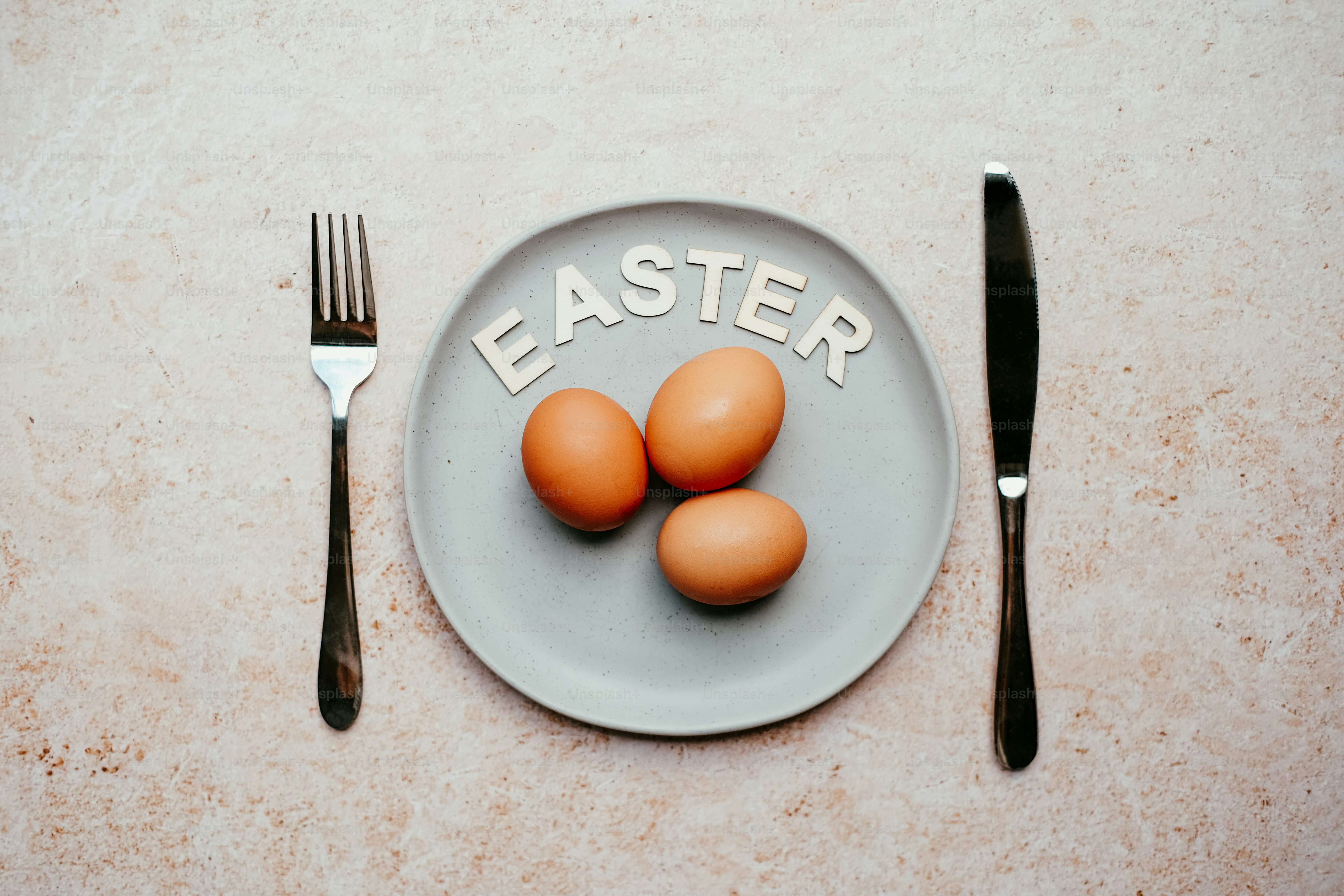 A plate with eggs, a fork and spoon on it photo – Easter Image on Unsplash