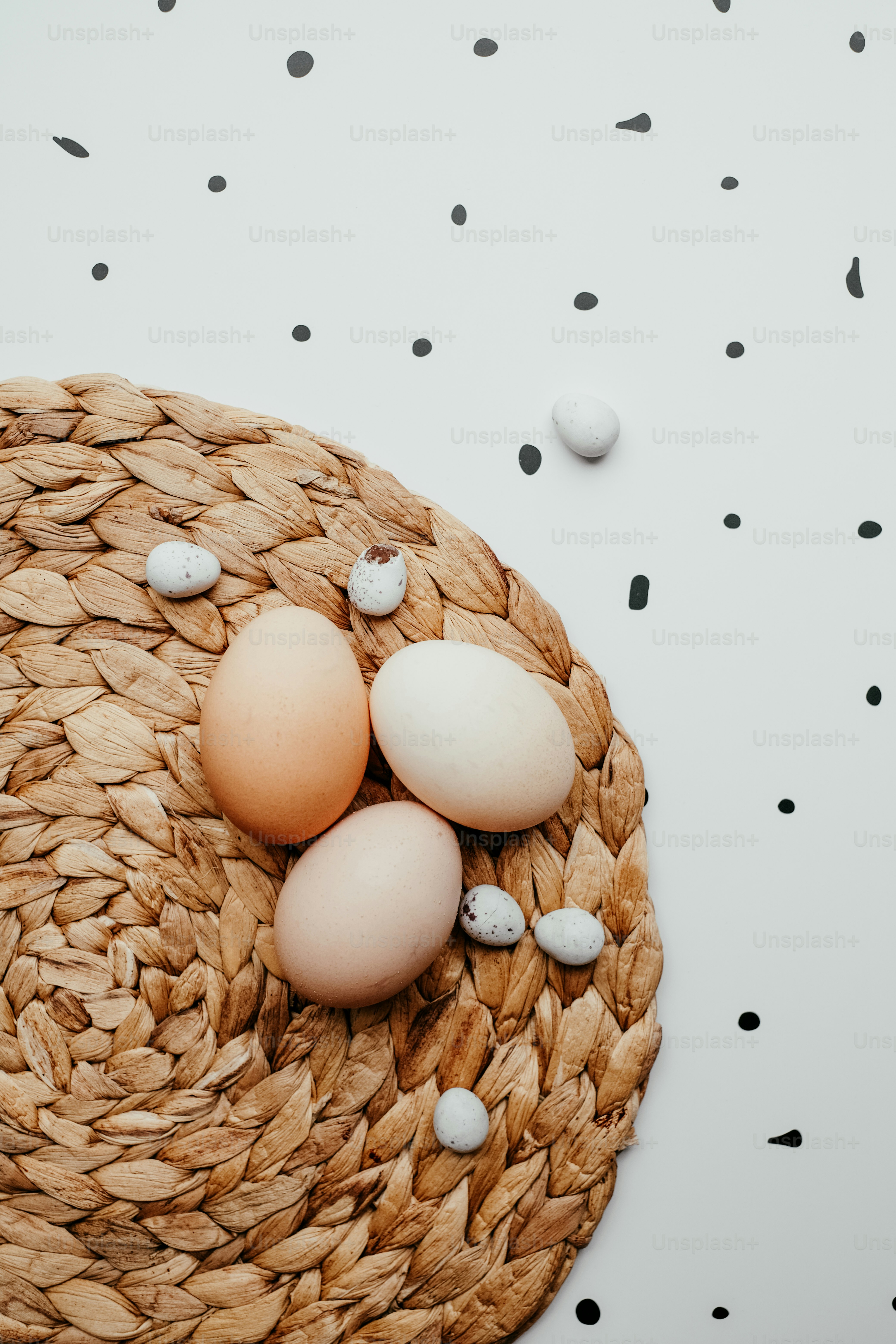 a basket filled with eggs sitting on top of a table