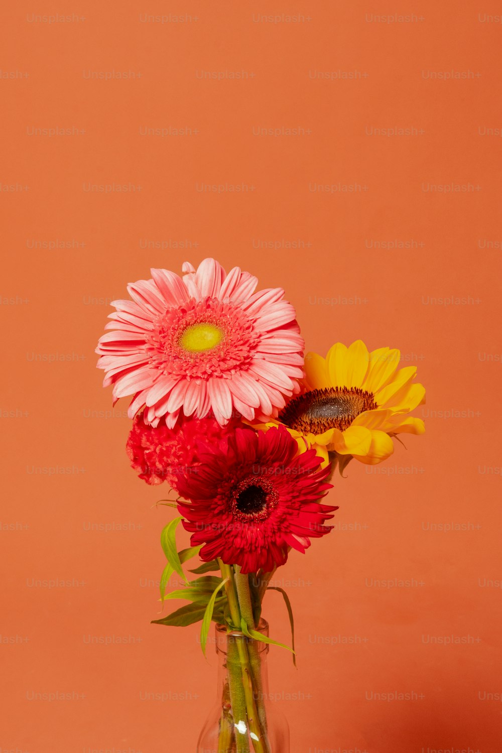 a vase filled with flowers on top of a table