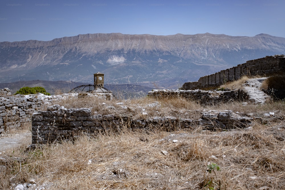 a view of a mountain range with a building in the foreground