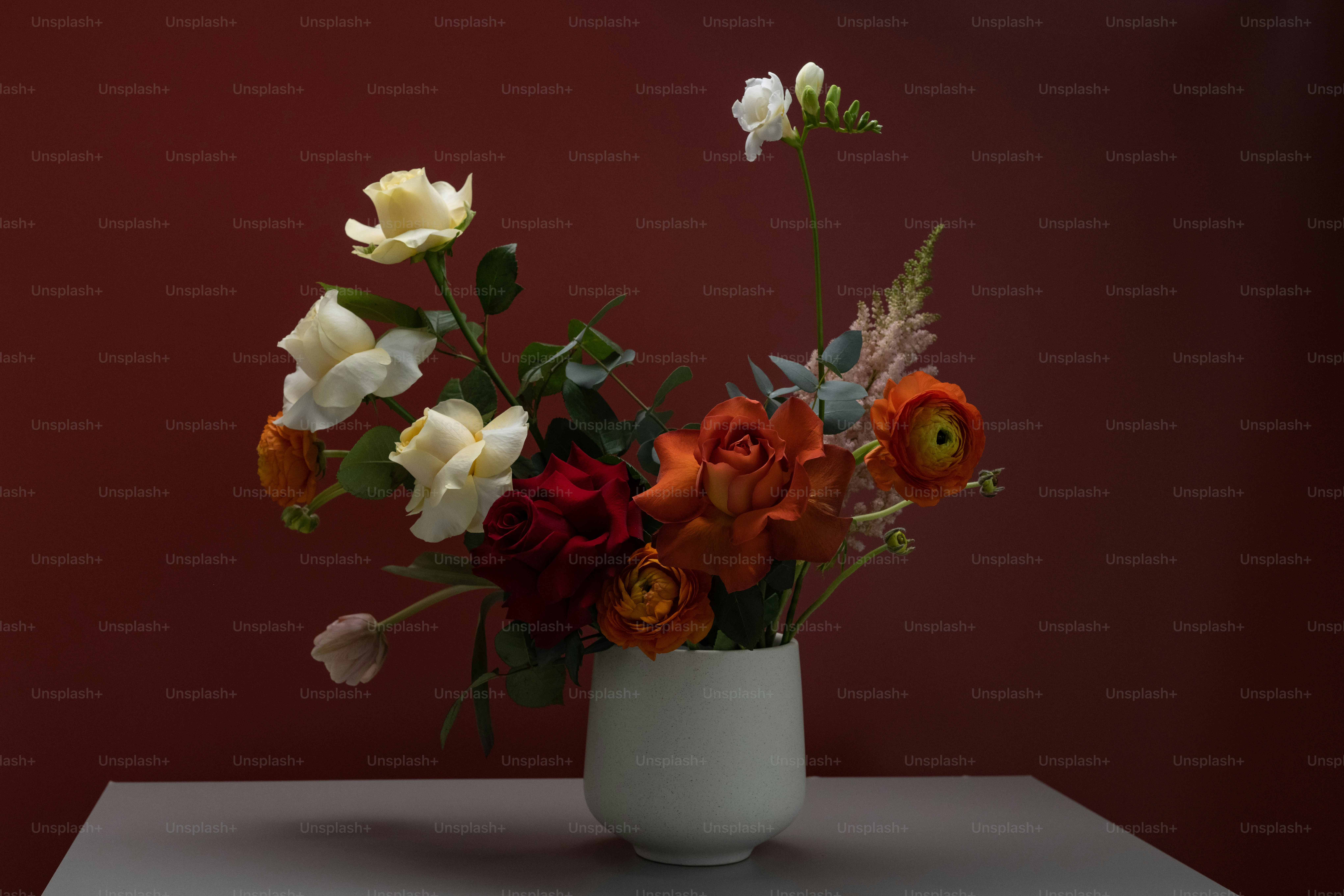 A vase filled with flowers on top of a table photo – Flowers Image on ...