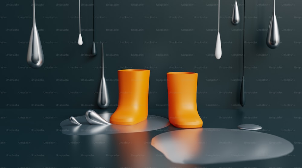 a pair of orange boots sitting on top of a table