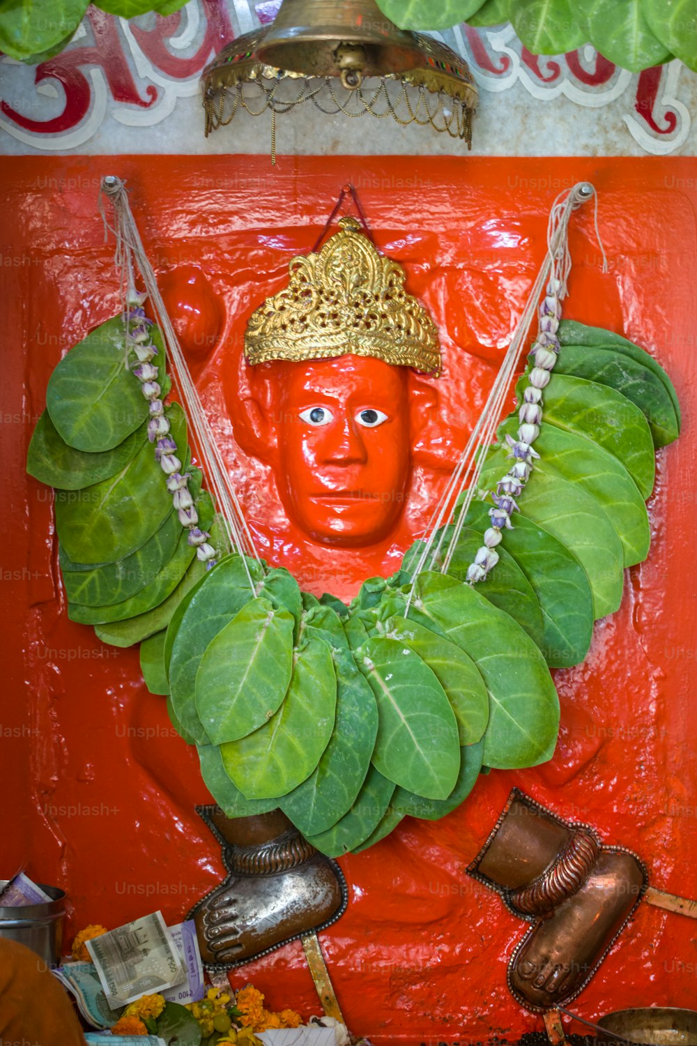 a statue of a man with a crown on his head