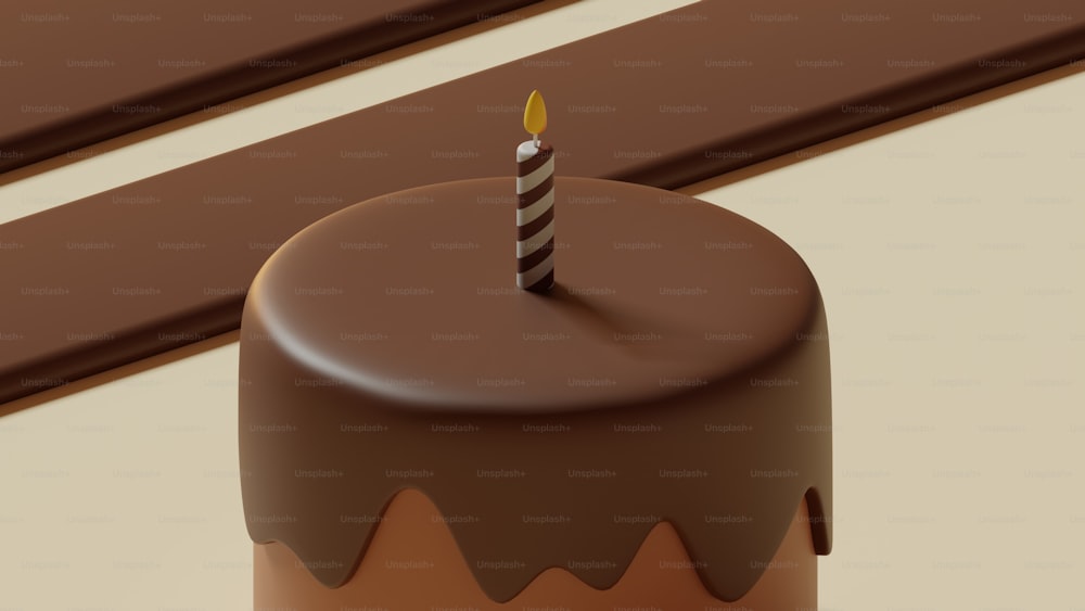 un pastel de chocolate con una sola vela encima