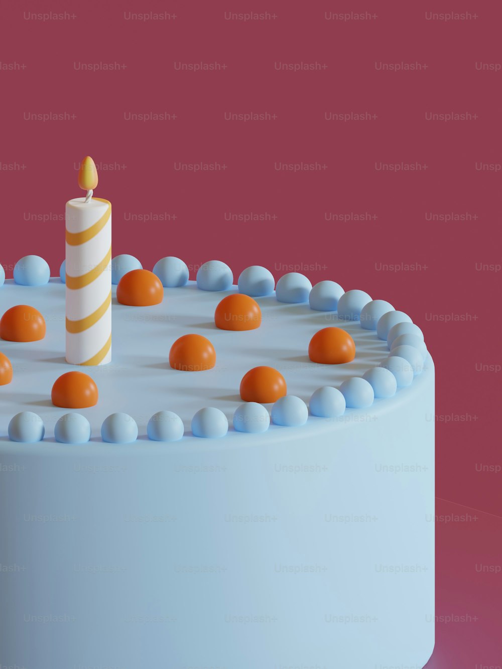 a cake with a lit candle on top of it