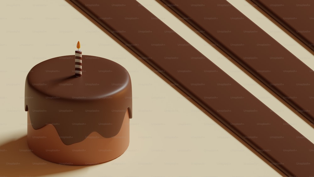 a chocolate cake with a lit candle on top of it