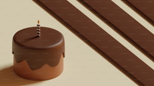 a chocolate cake with a lit candle on top of it