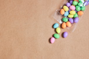 a bag filled with candy sitting on top of a table