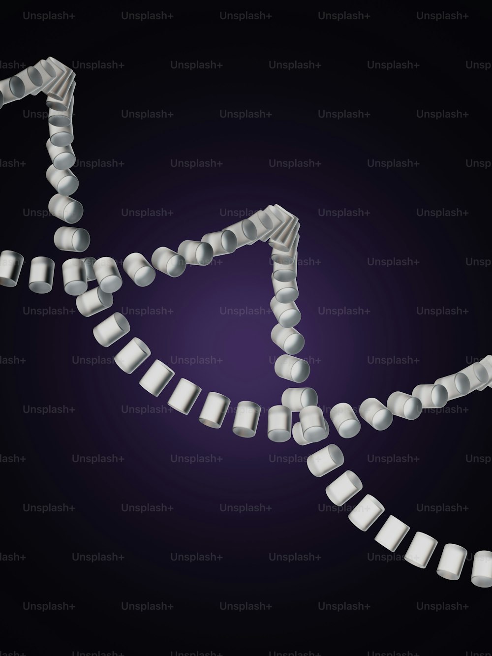 a strand of beads with a purple background