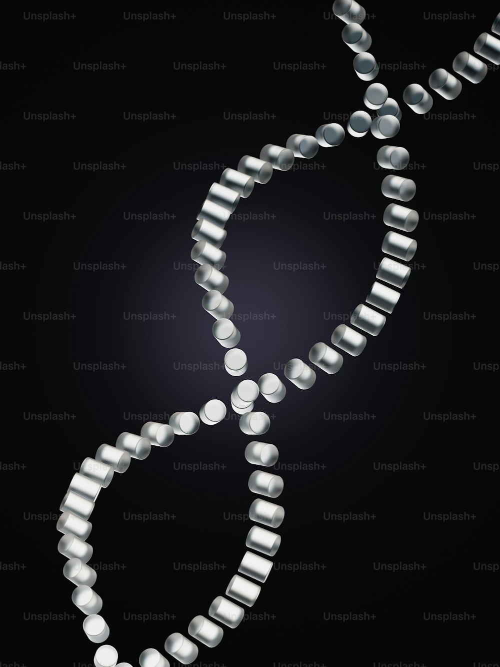 a strand of beads with a black background