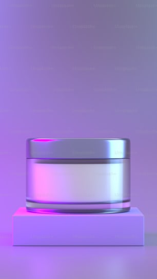 a silver ring sitting on top of a white box