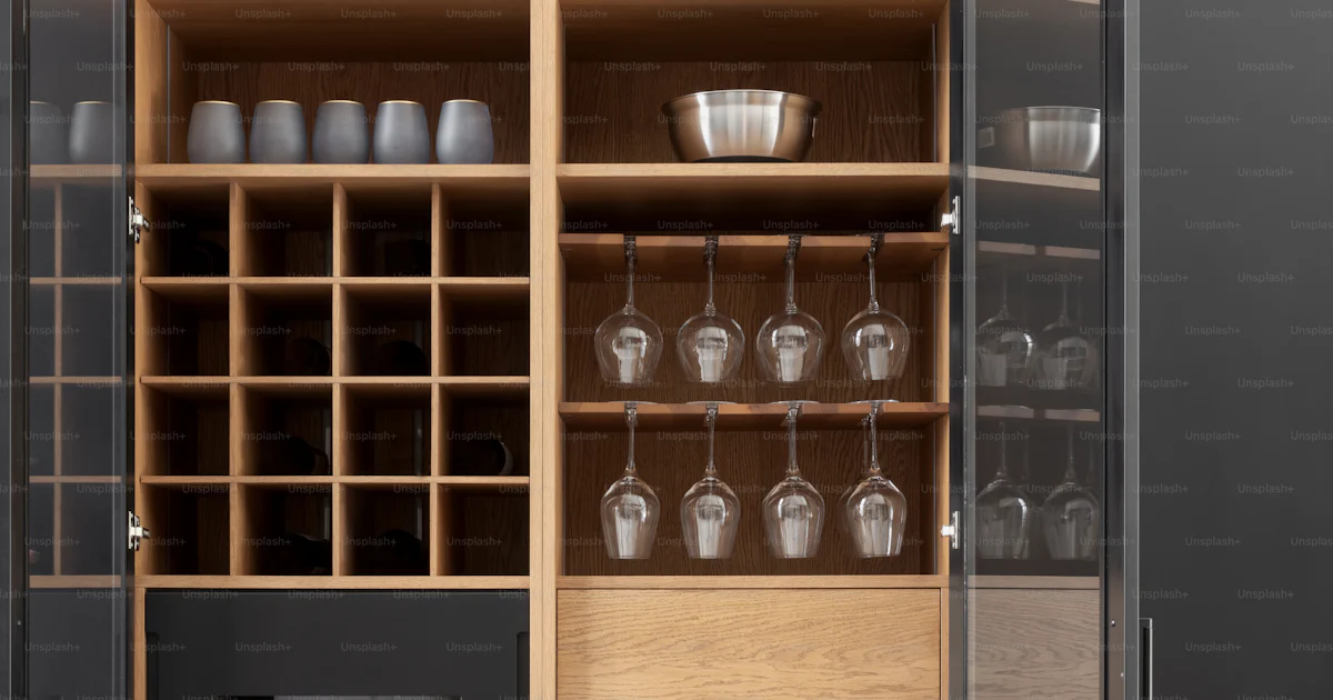 A kitchen with a wine rack and wine glasses photo – Interior design ...