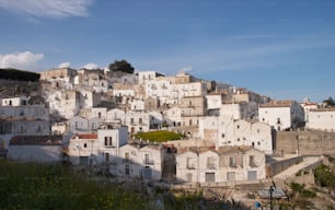 a large group of buildings on top of a hill