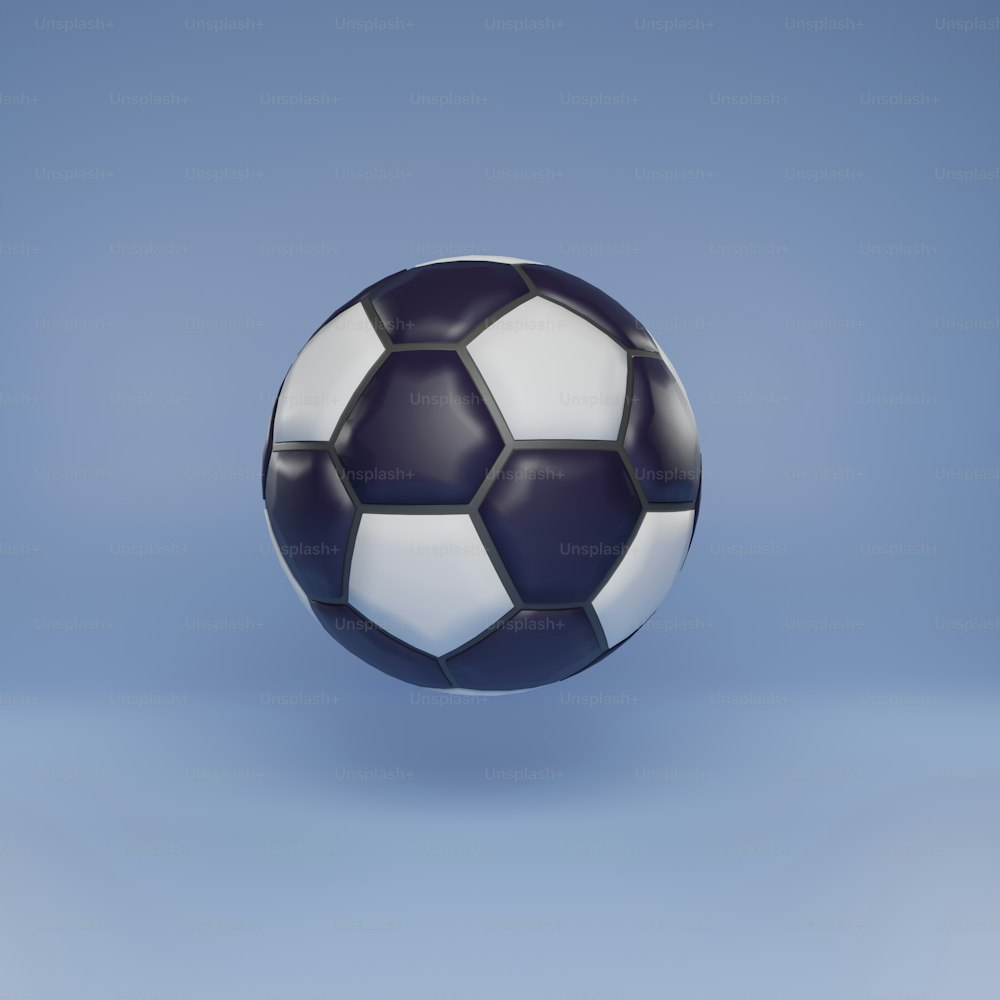 un ballon de football noir et blanc sur fond bleu