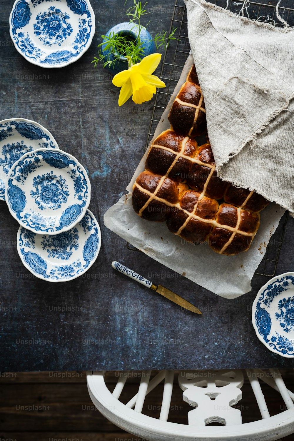 a table topped with blue and white plates