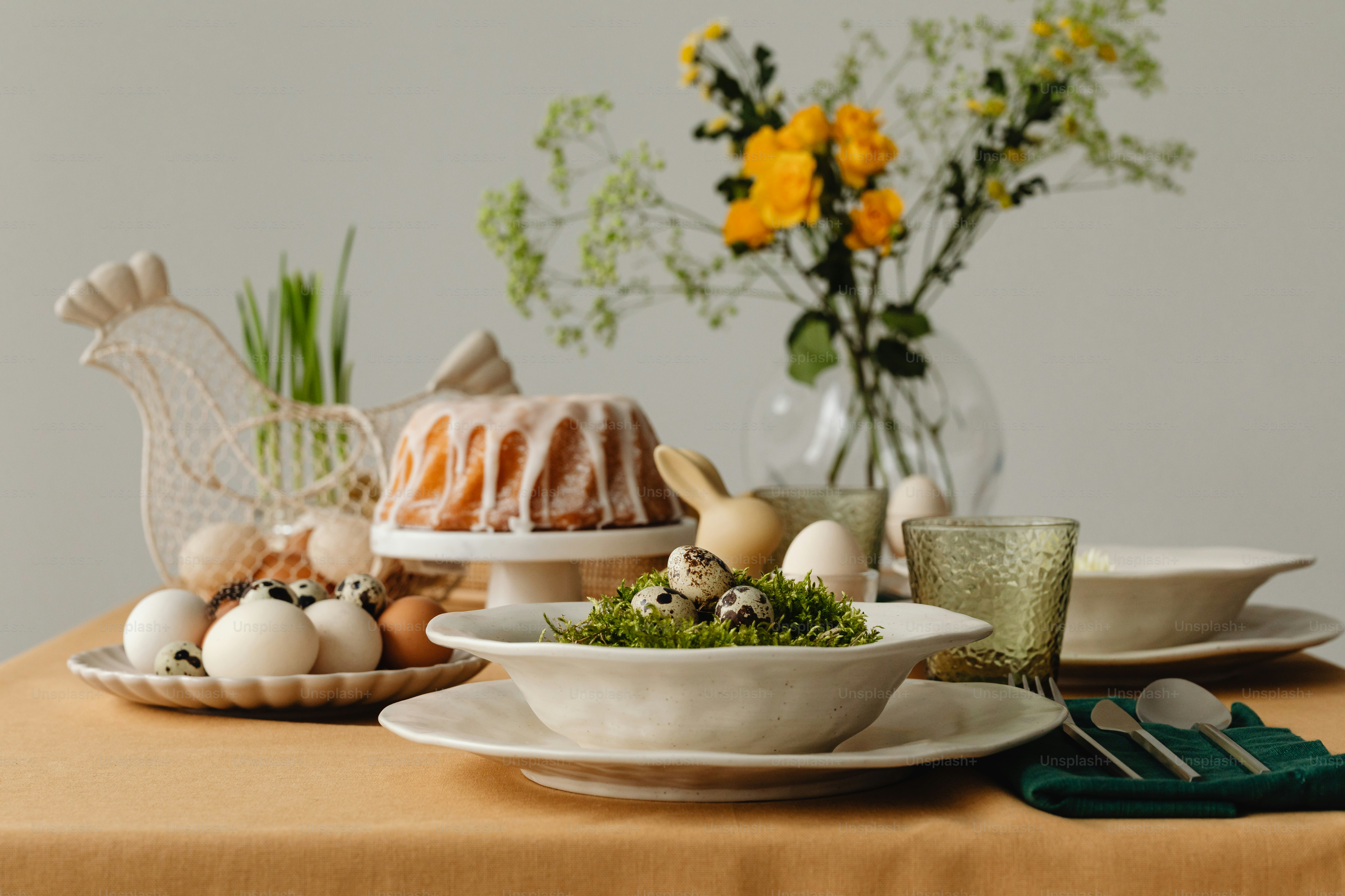 a table topped with plates and bowls filled with food