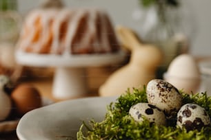 a white plate topped with eggs next to a bundt cake