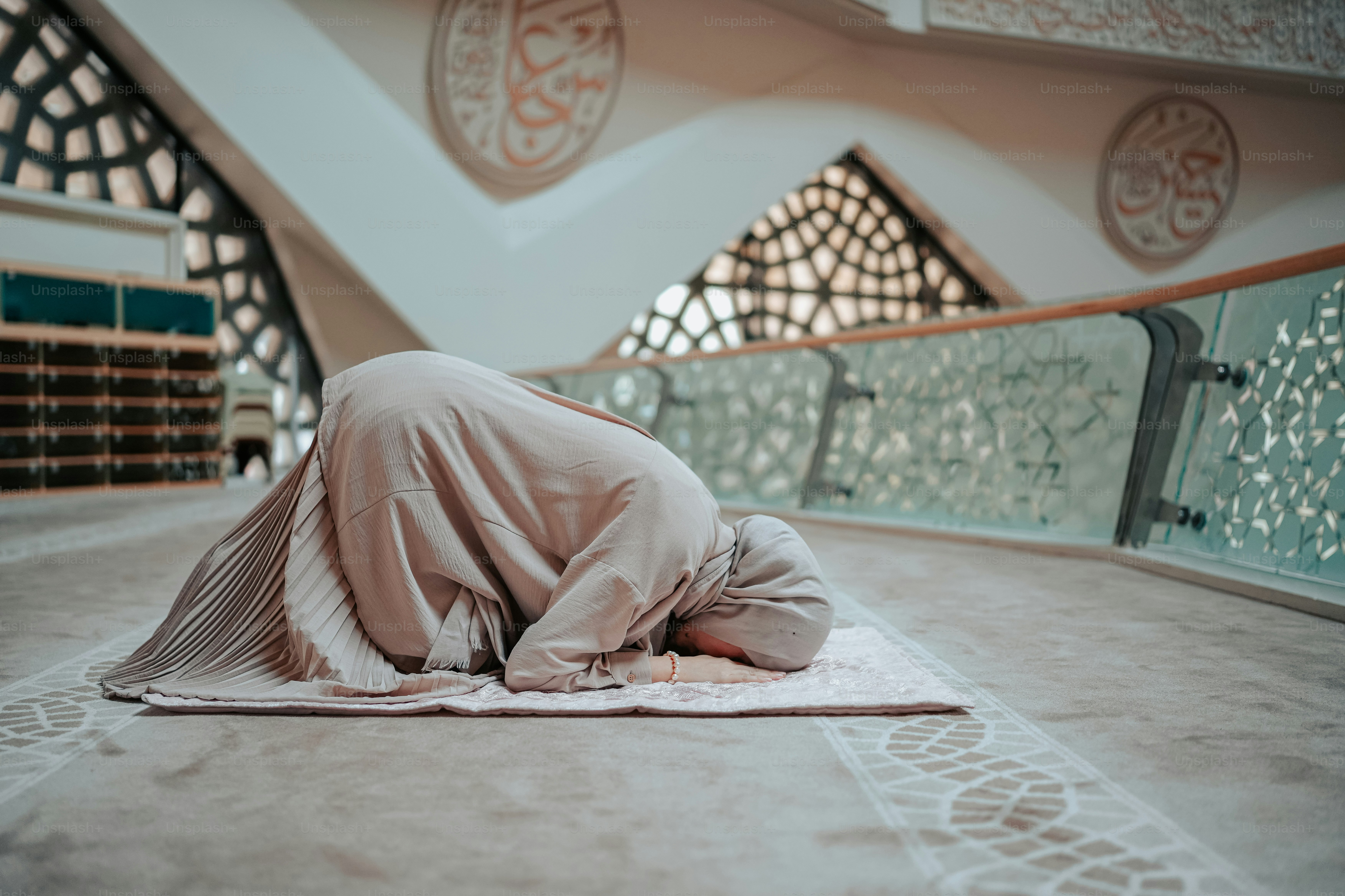 a person laying on a rug in a room