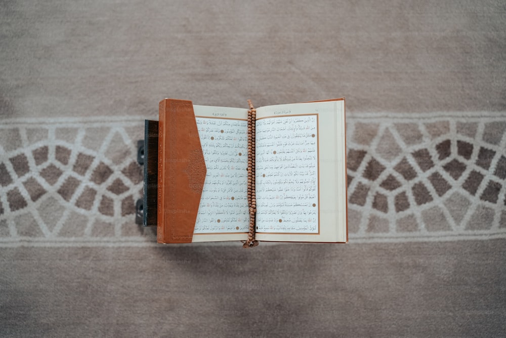 an open book with arabic writing on it