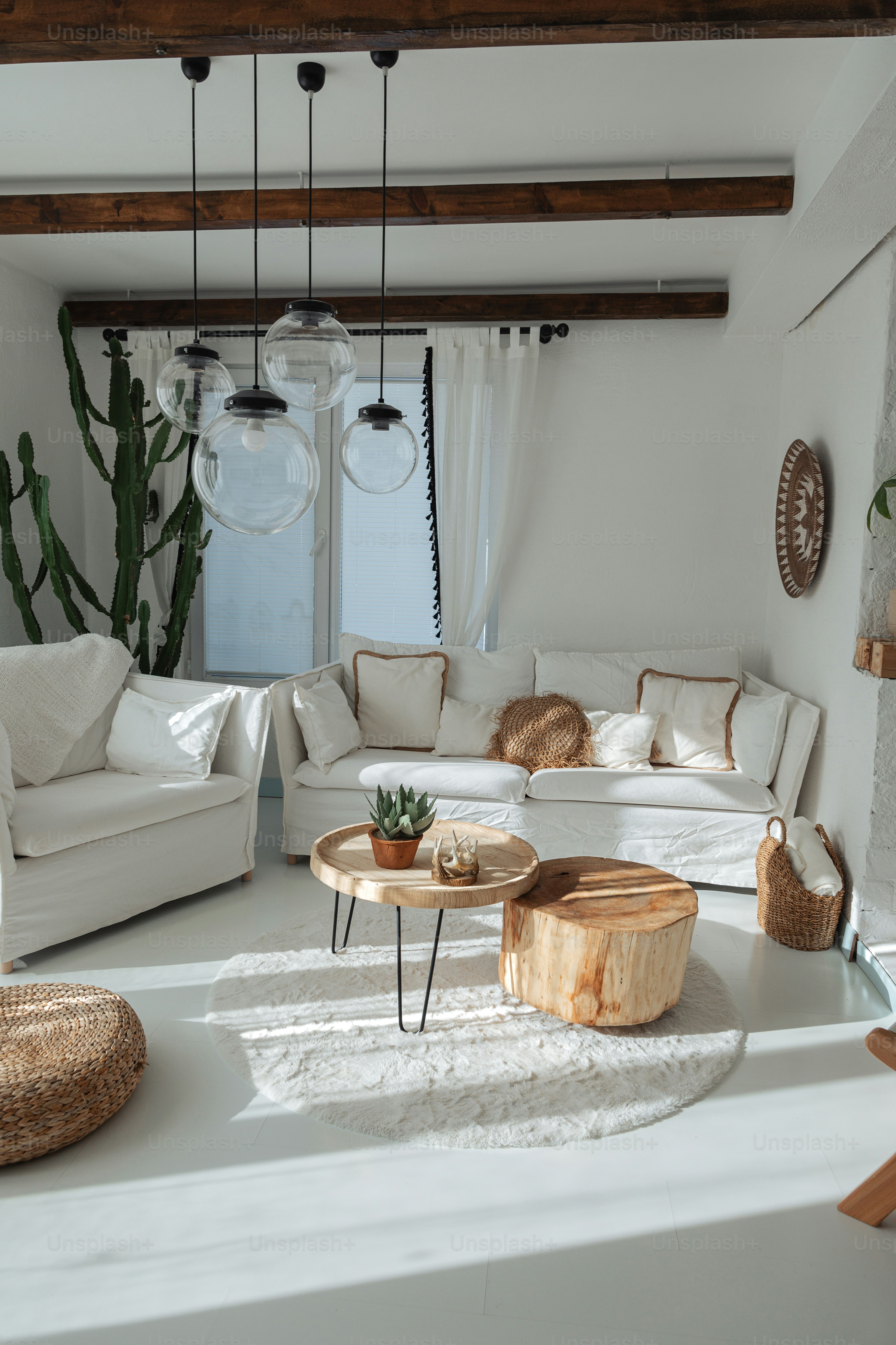 a living room filled with furniture and a fire place