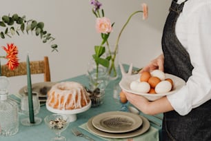 a person holding a plate with eggs on it