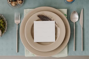 a place setting with a place card and silverware