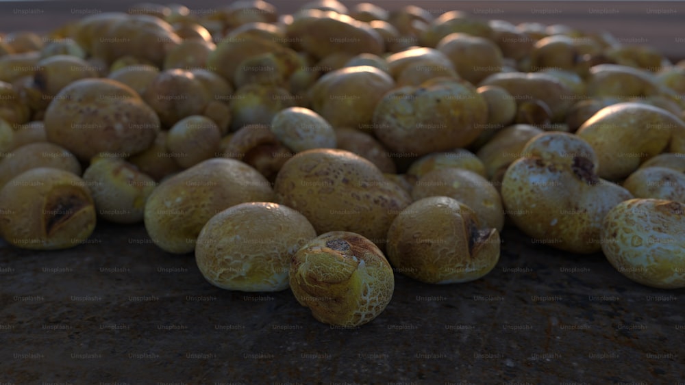 a pile of potatoes sitting on top of a table