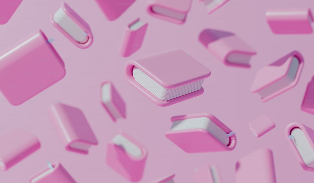 Eine Gruppe rosa Objekte, die auf einer rosa Oberfläche schweben