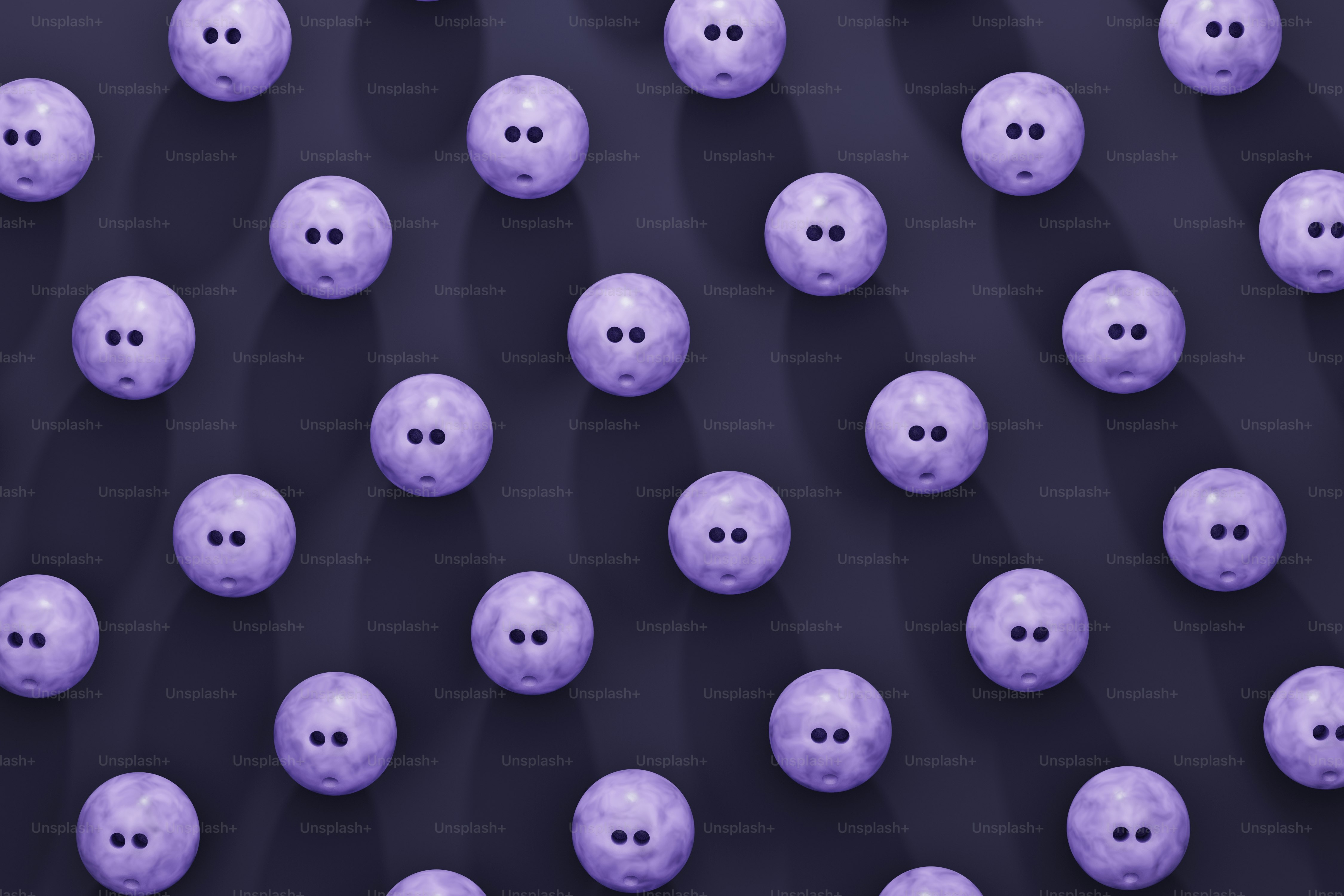 A bunch of purple balls with holes in them photo Bowling Image on