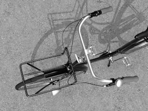 a black and white photo of a bicycle