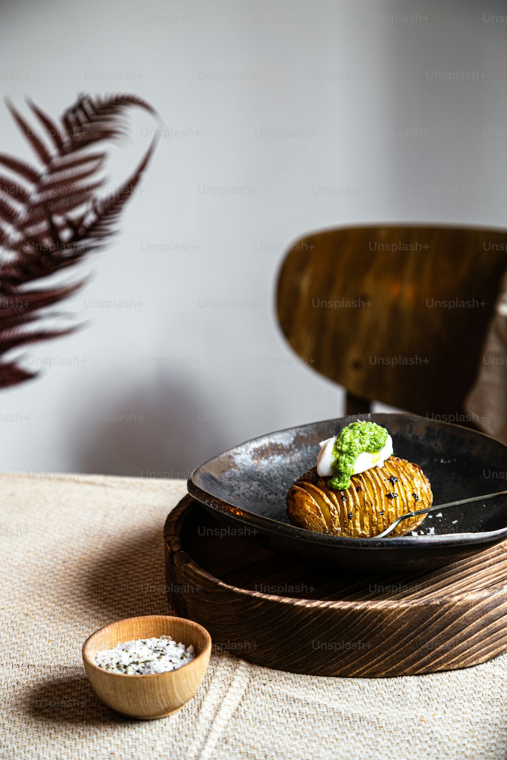 a plate of food on a wooden table