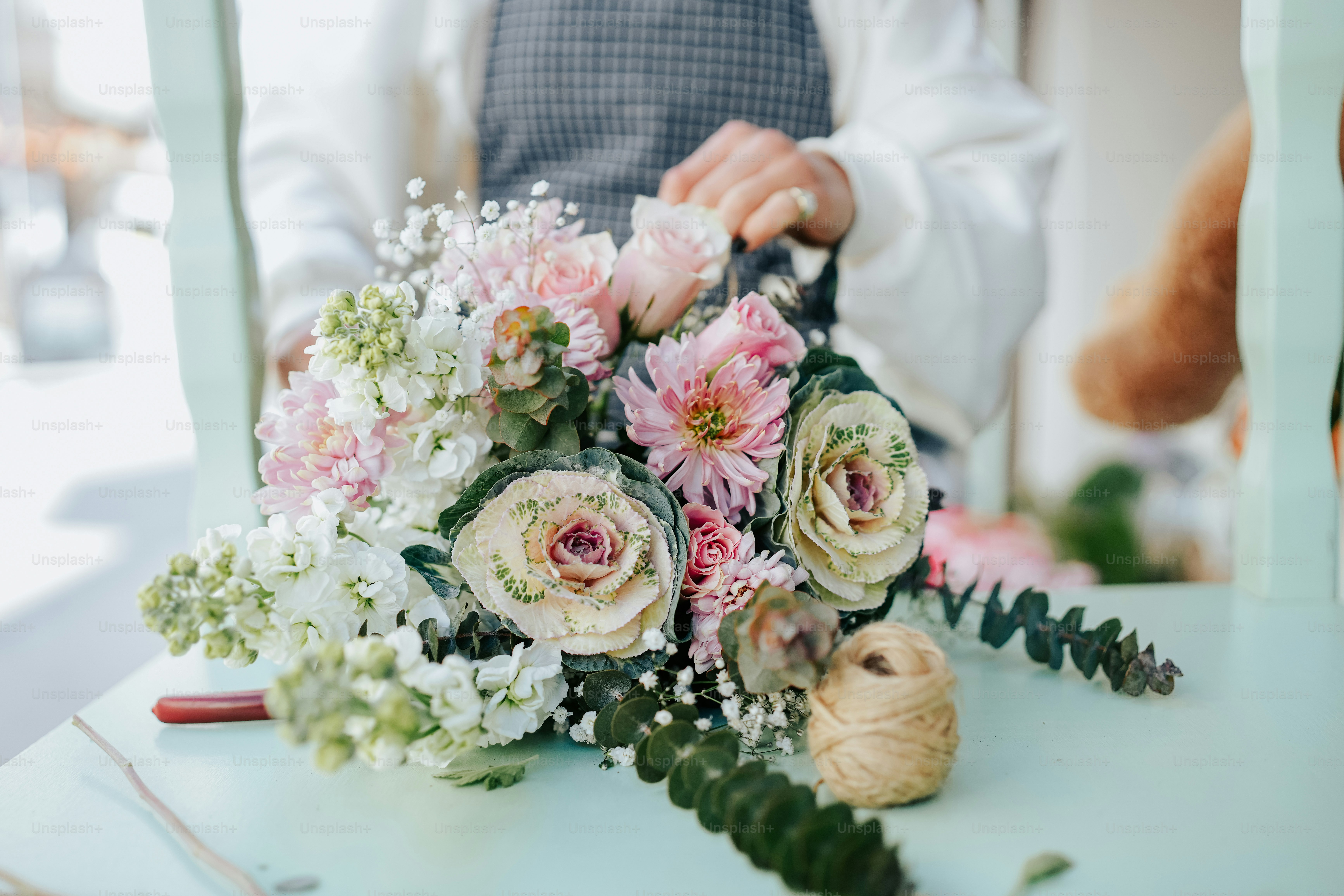 a bouquet of flowers sitting on top of a table