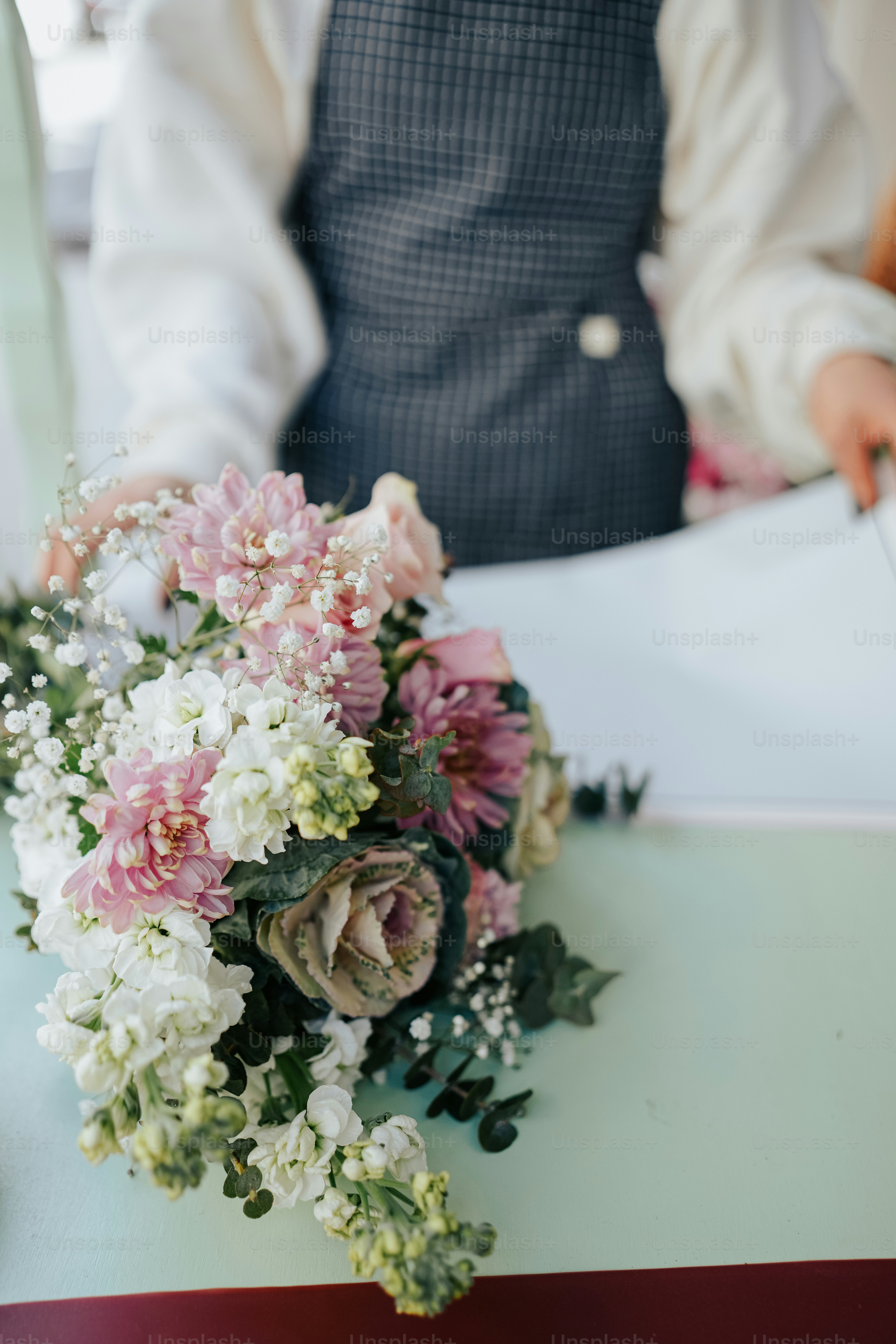 a bouquet of flowers sitting on top of a table