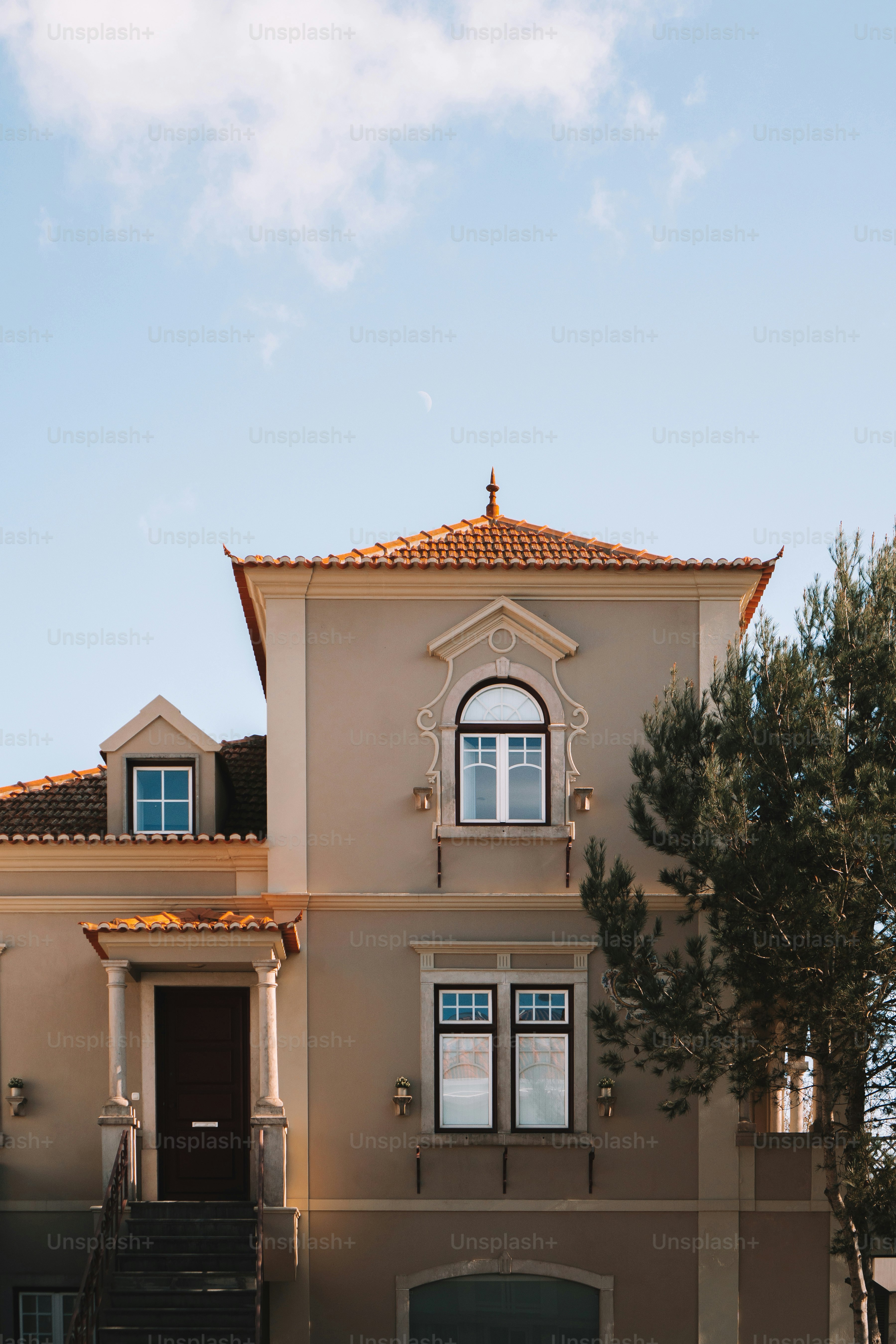 a house with a car parked in front of it