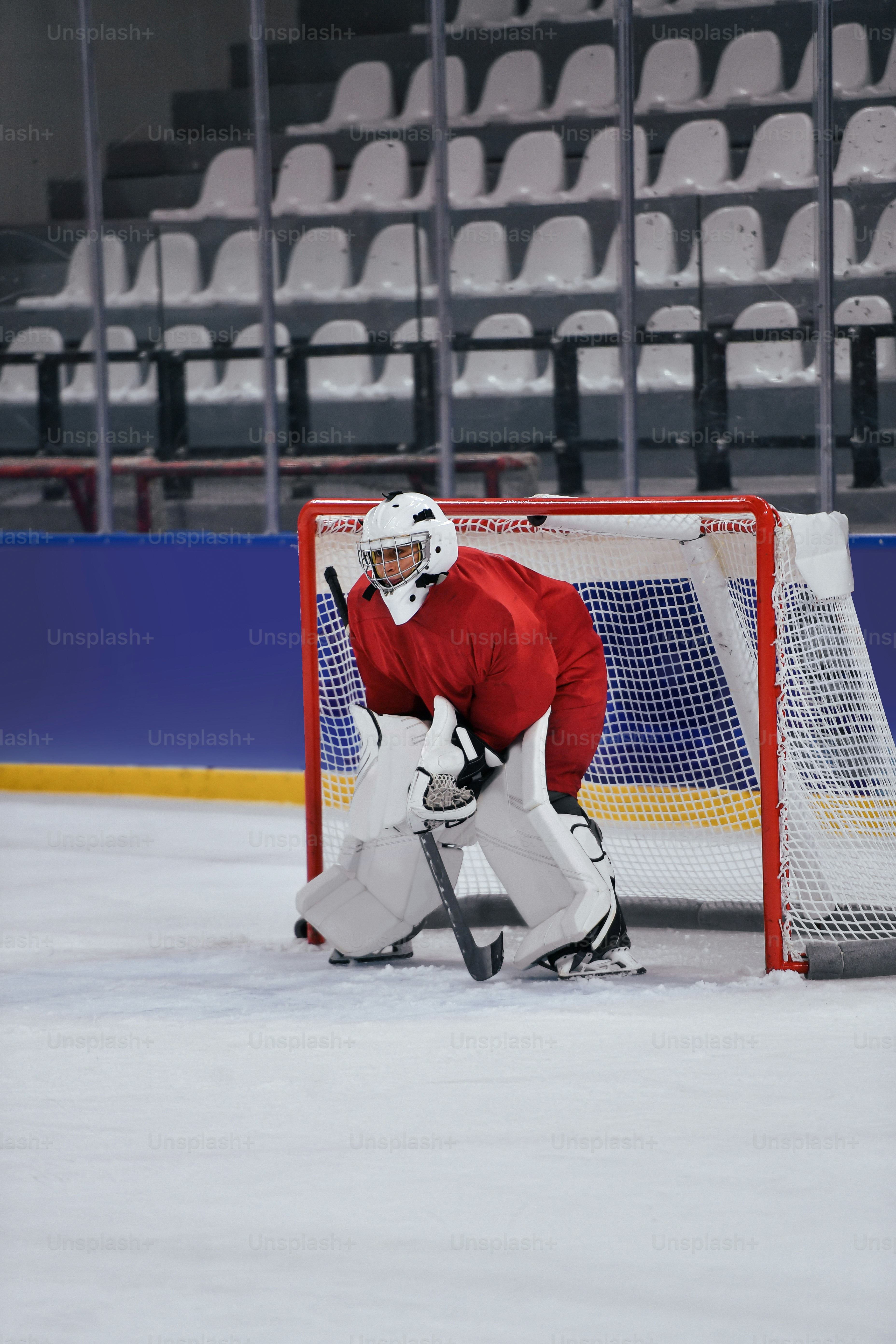 a hockey goalie waiting for the next play