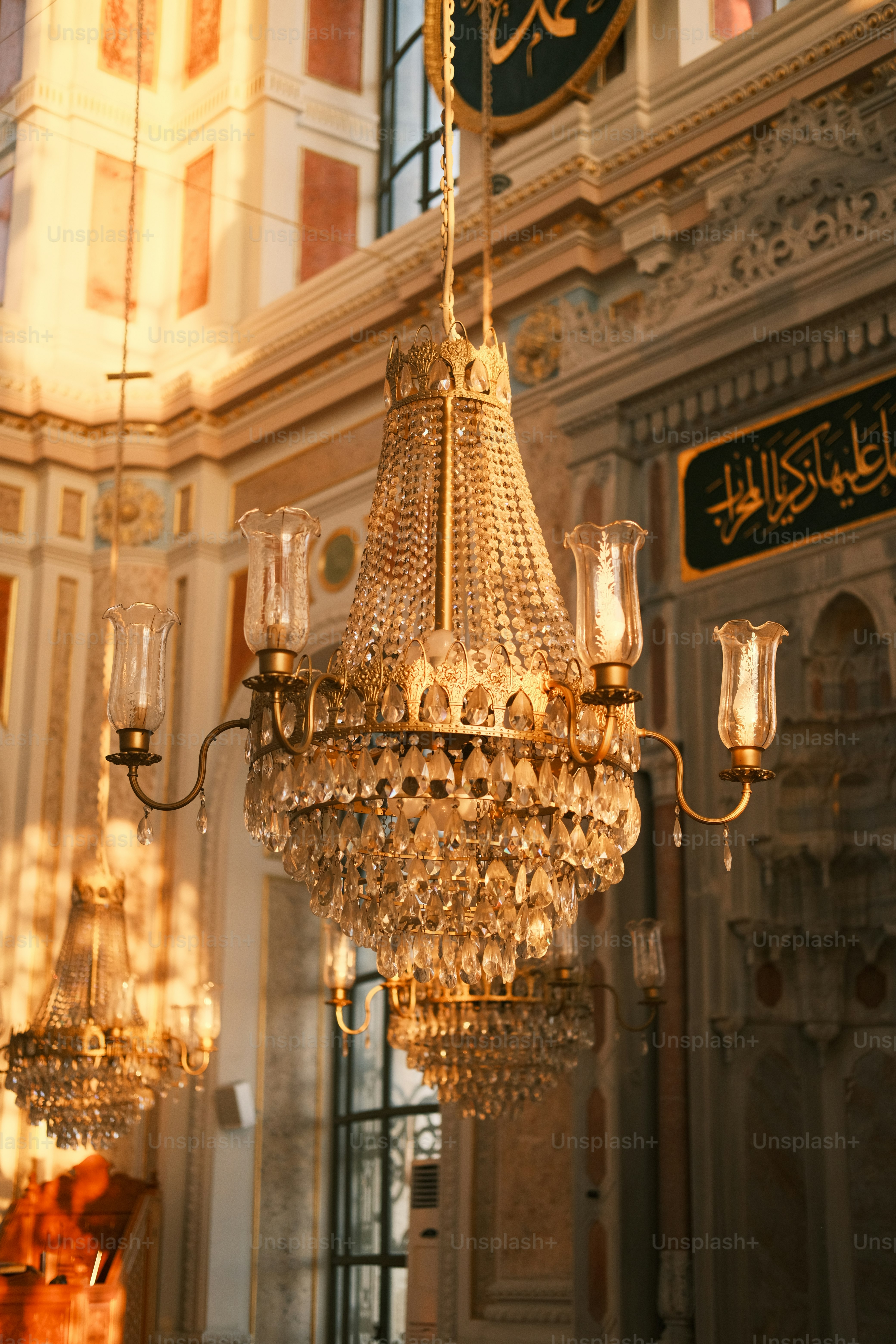 a chandelier hanging from the ceiling of a building