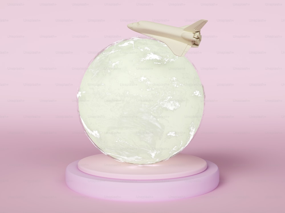 um modelo de um avião voando sobre um globo
