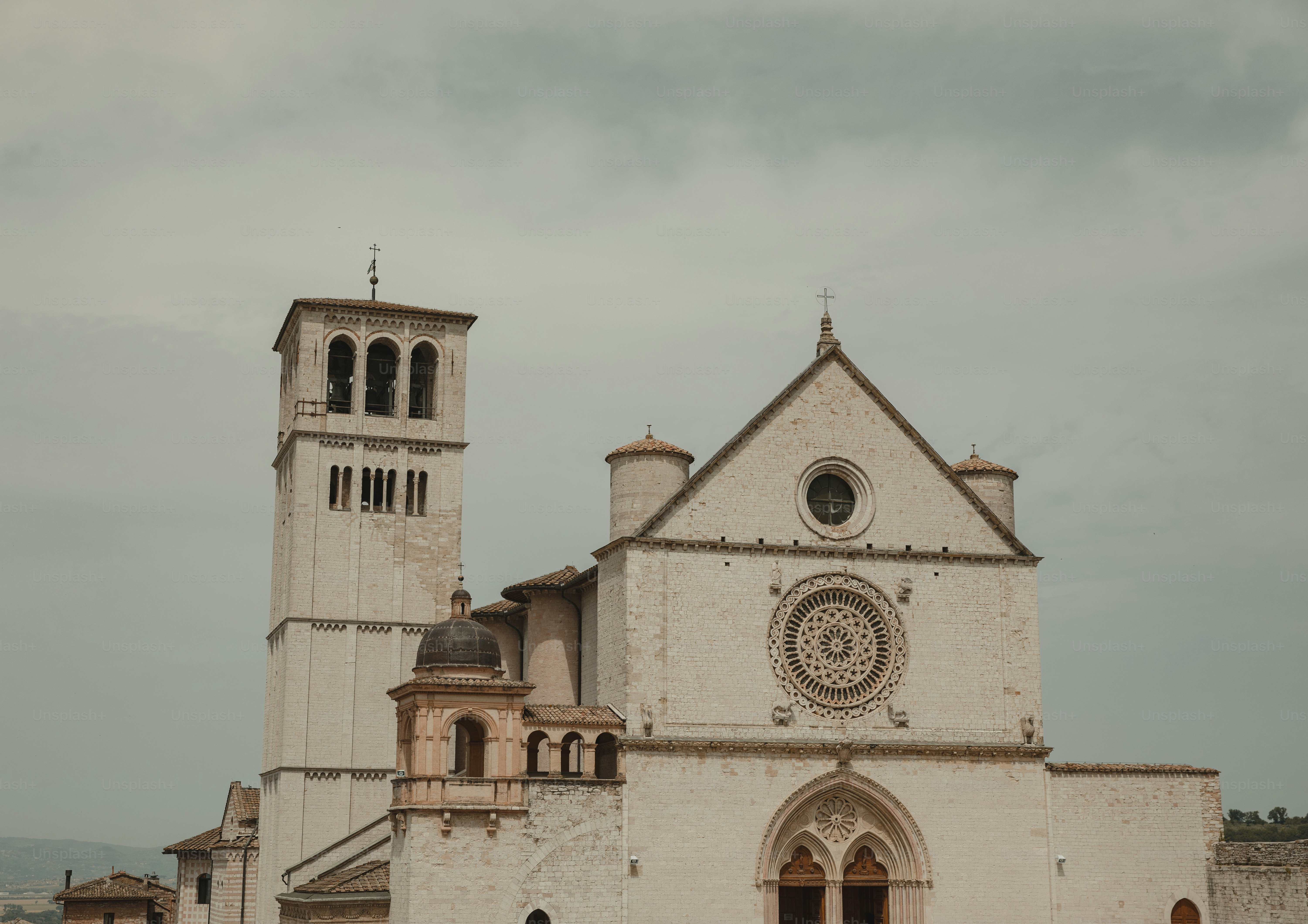 a large white church with a clock tower