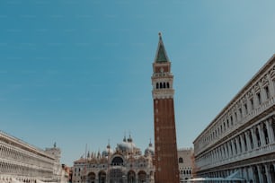 a tall clock tower towering over a city