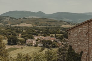 a view of a small village in the mountains