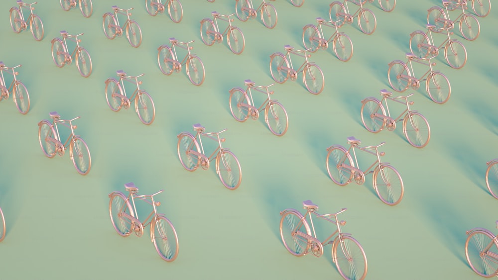 a large group of bicycles that are on a table