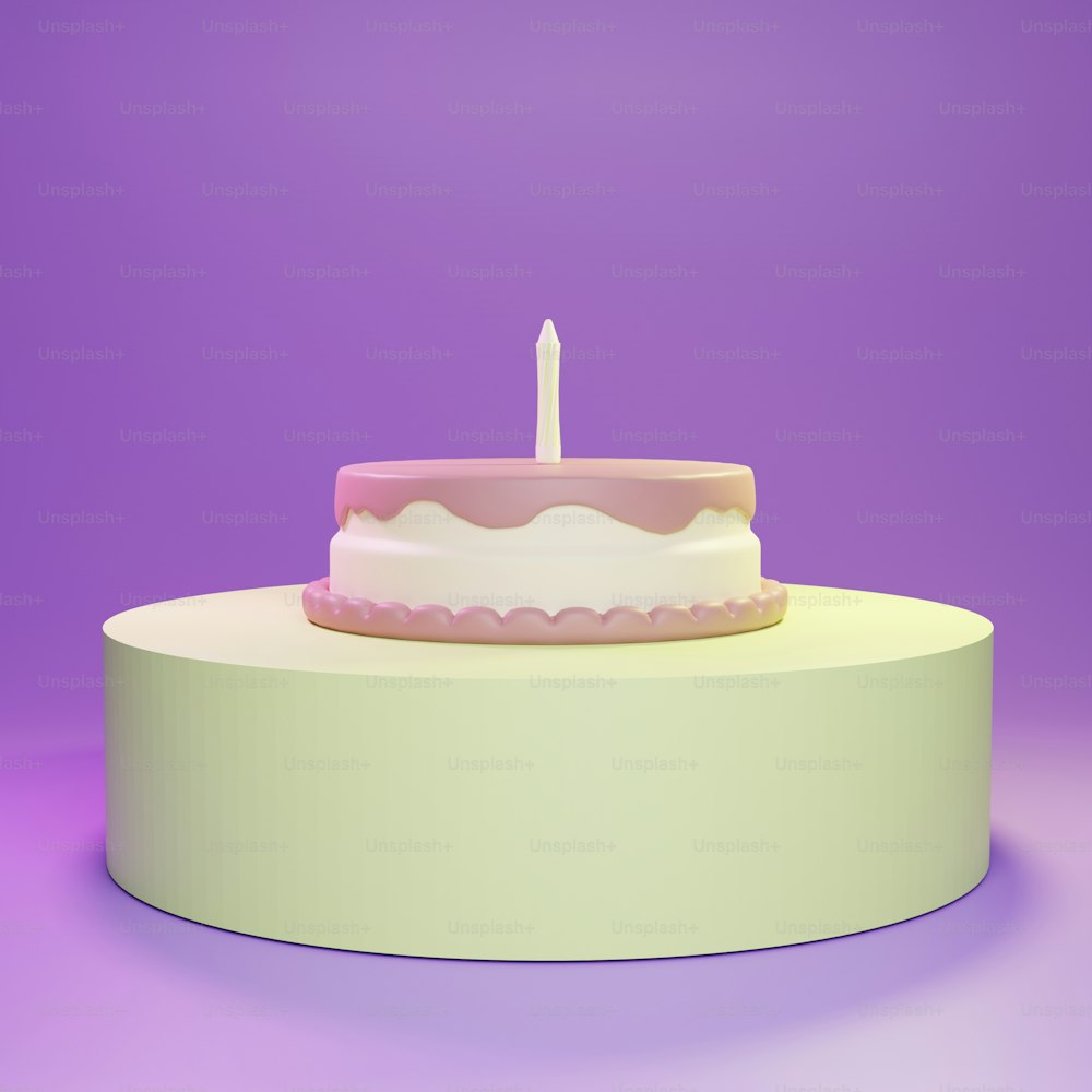 un pastel blanco con una vela rosa encima