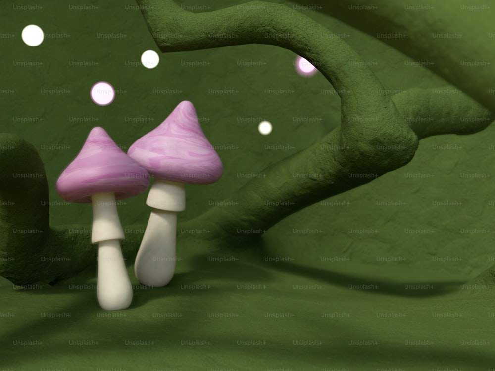 um par de cogumelos sentados em cima de uma superfície verde