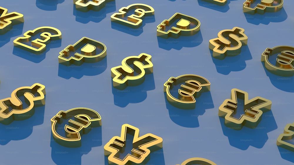 a bunch of gold letters that are on a blue surface