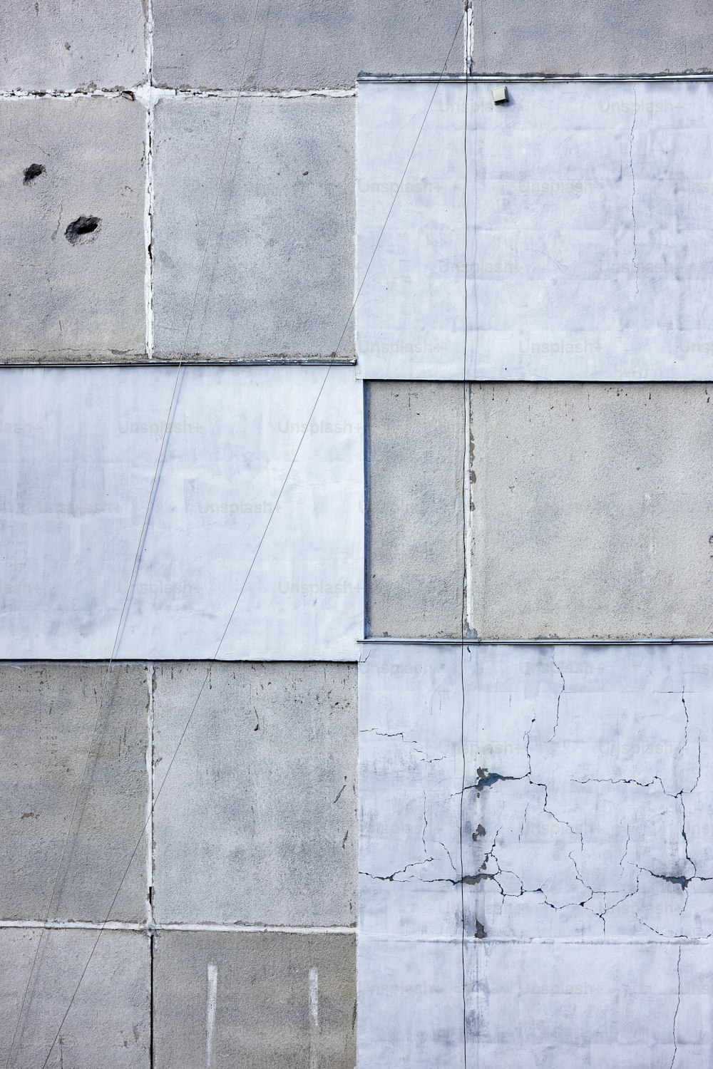 a close up of a wall made of cement blocks