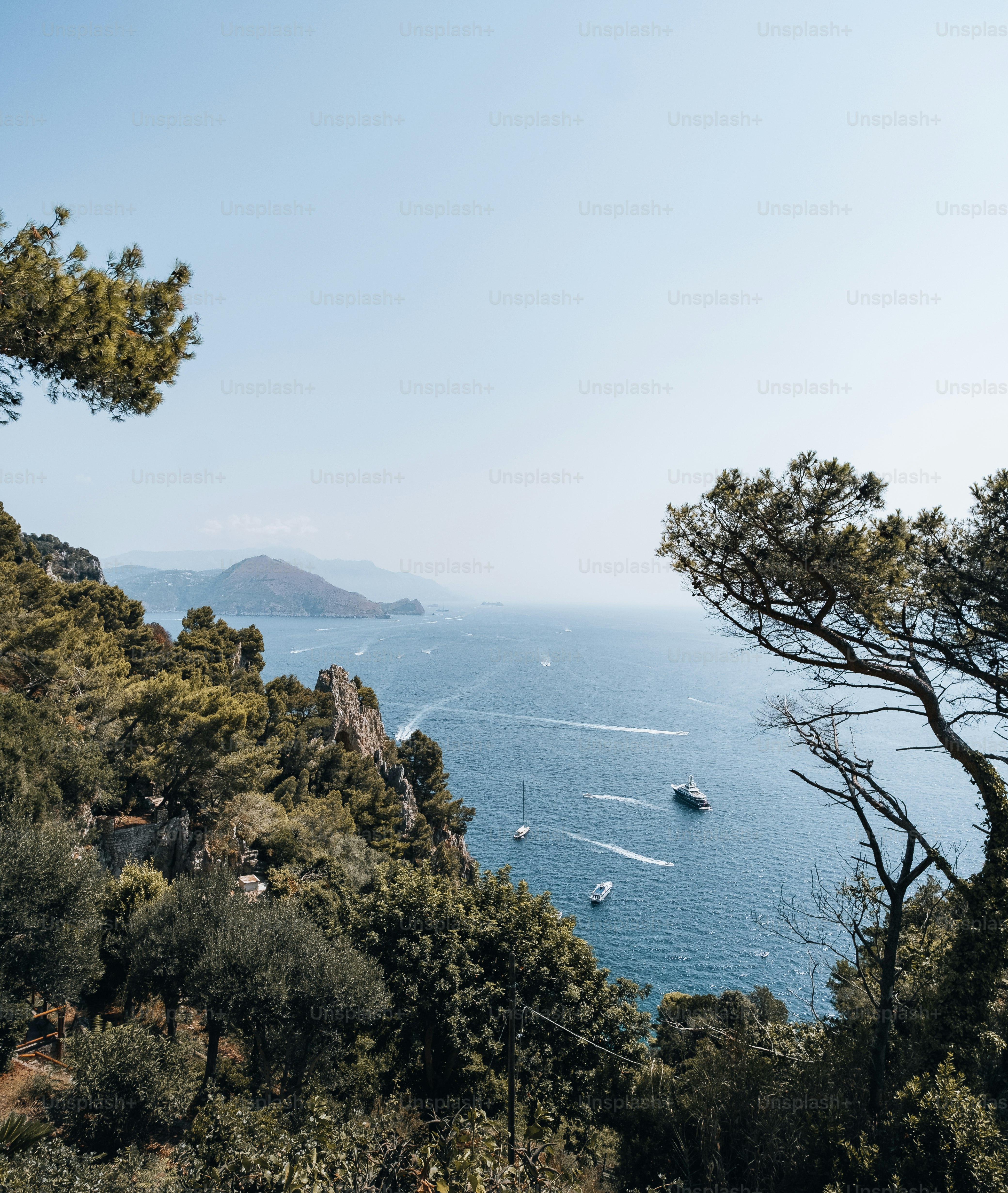 a view of a body of water from a hill