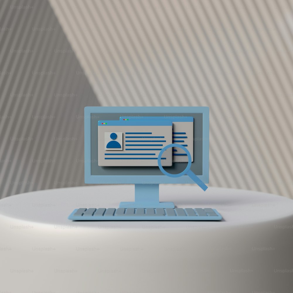 a computer screen sitting on top of a white table